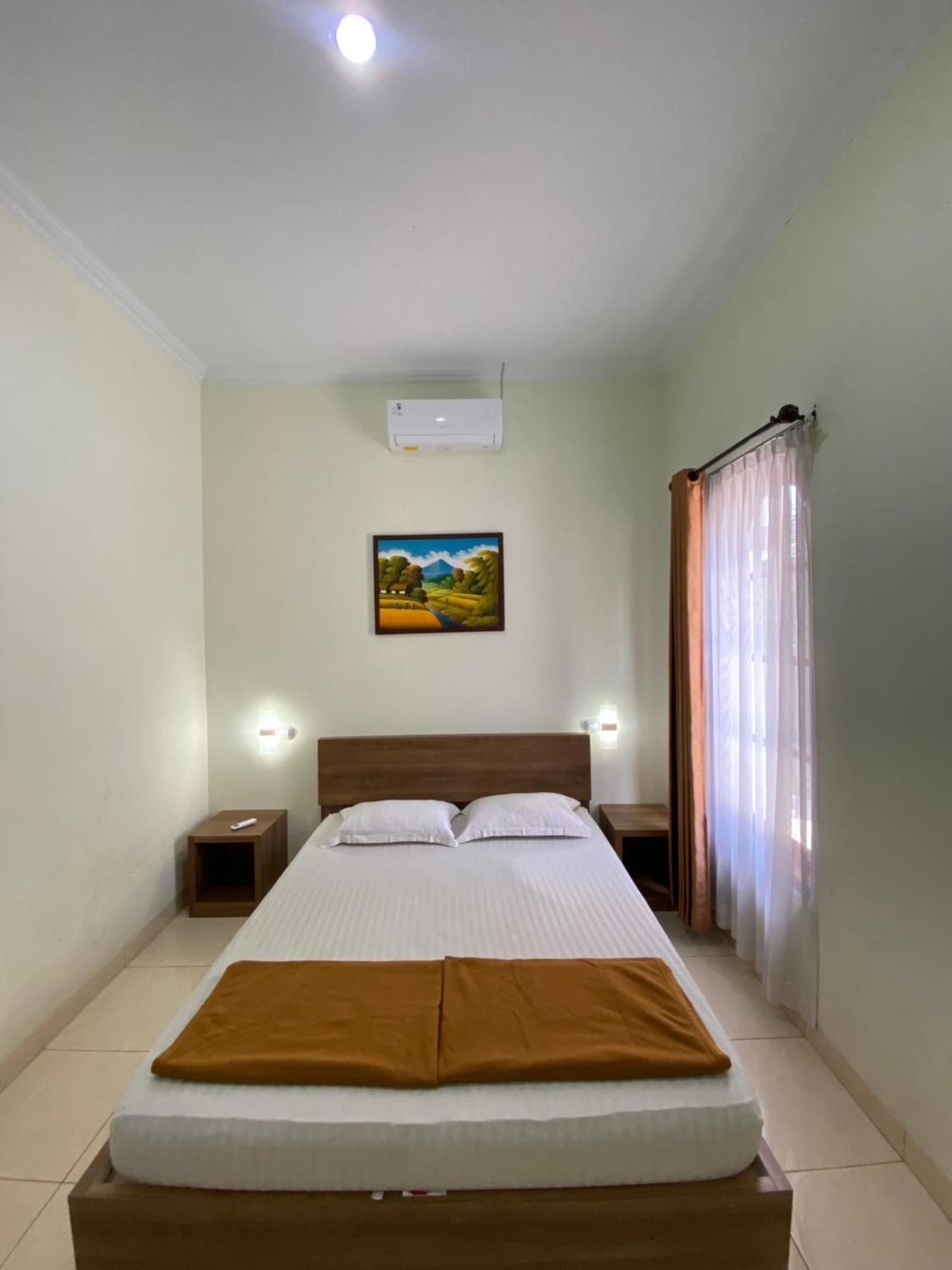 Adiputra Guesthouse 2 By Homiq Ngabean Exteriör bild